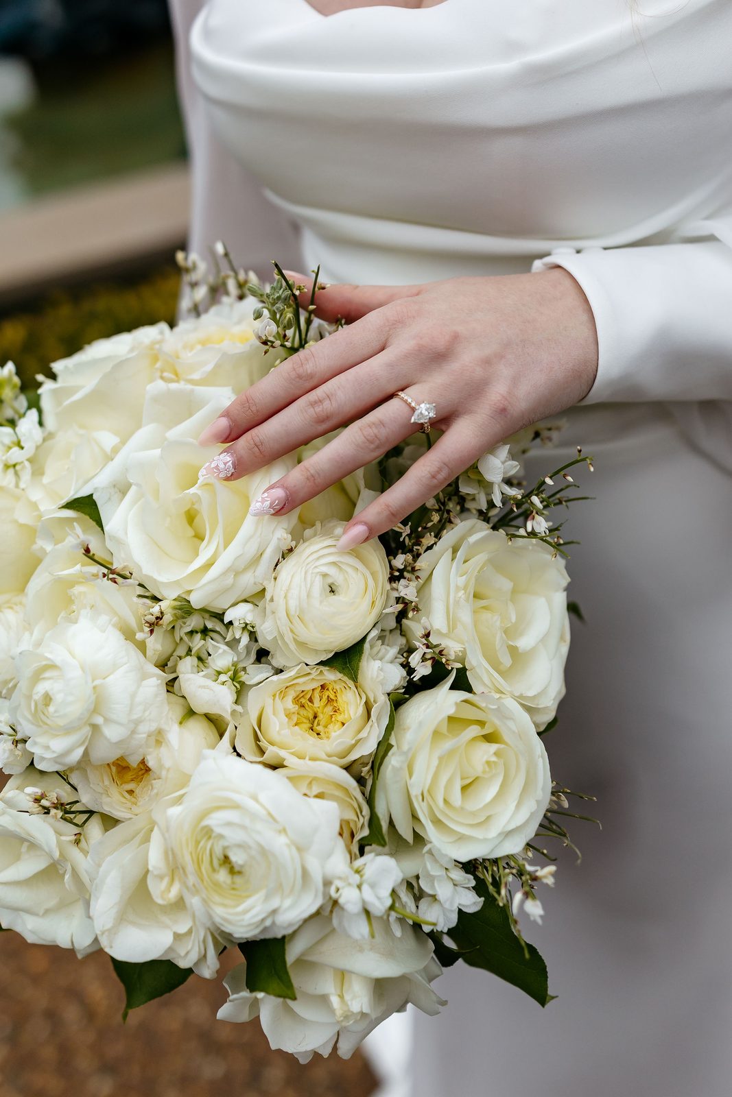 Ivory garden rose and ranunculus wedding bouquet